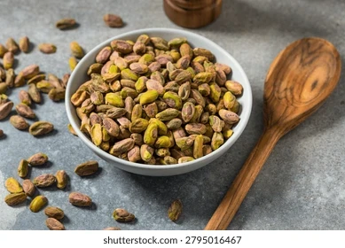 Shelled premium pistachios in a bowl